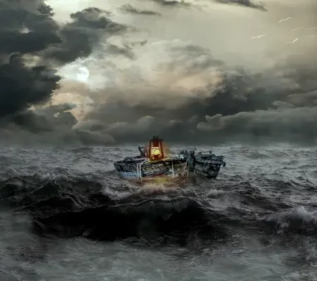single tugboat at sea in rough waves avoiding disaster