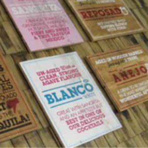 thumb-nail-list-pic-retail-pos | The Document Group signs hanging on a wall